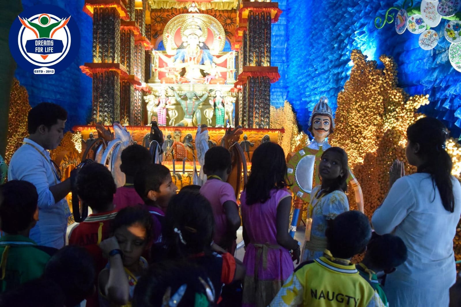 Taking in the grand Puja atmosphere